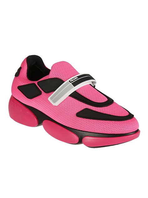 hot pink prada sneakers.